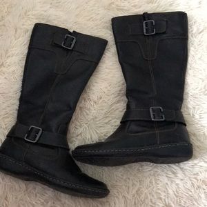 Black high buckle boots